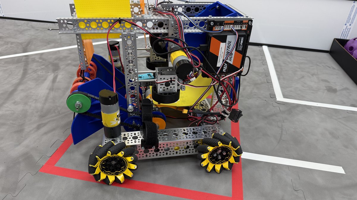 A student-built competition robot on the practice field.